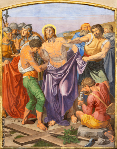 VIENNA, AUSTIRA - OCTOBER 22, 2020: The fresco Jesus clothes are taken away in the church of St. John the Nepomuk by Josef Furlich (1844 - 1846).