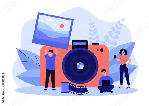 Tiny people taking photo flat vector illustration. Cartoon guy holding full picture. Big camera on background. Artistic occupation and photography courses concept