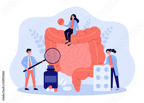 Tiny doctors checking and treating large intestine flat vector illustration. Cartoon inflammation in digestive system. Medicine and health concept