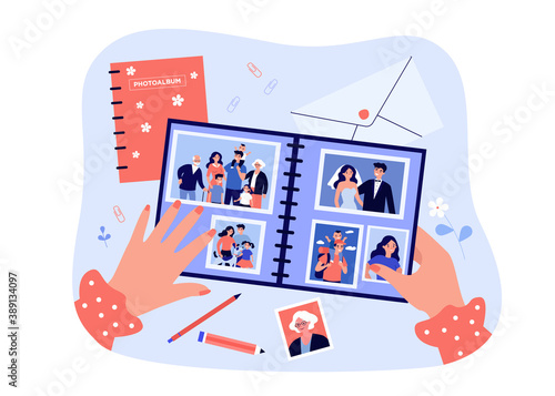 Female photographer hands holding family photo album flat vector illustration. Cartoon characters on retro photography. Happy memory and lifestyle concept