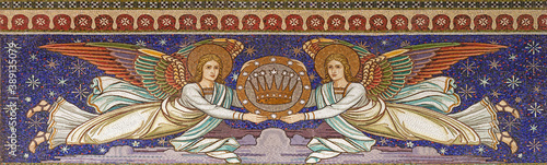 Photography VIENNA, AUSTIRA - OCTOBER 22, 2020: The mosaic of angels withe the crown in church Pfarrkirche Kaisermühlen