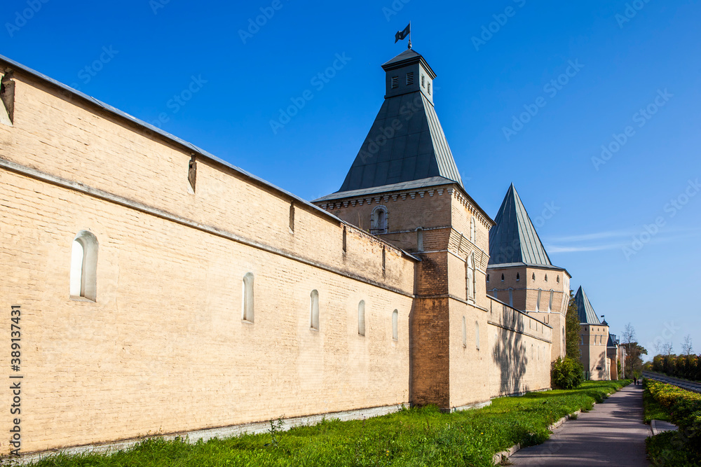 Fortress wall with towers. The complex of the former barracks of the ...
