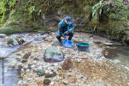 Outdoor adventures on river. Gold panning