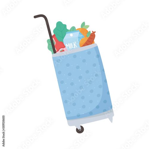 shopping trolley with different goods, grocery purchases