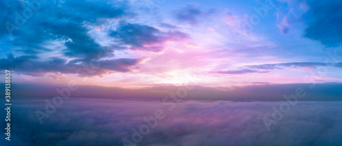 Purple paradise sunrise above the clouds, panorama © maykal