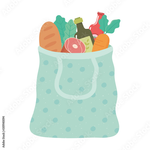 shopping bag with bread, olive oil, carrot, grocery purchases