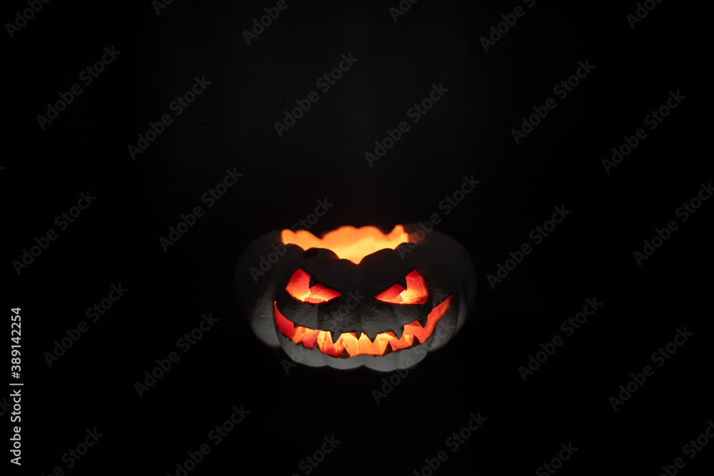 A terrible pumpkin with burning eyes, a cloud of smoke enveloped it. Halloween is coming soon A terrible pumpkin with burning eyes, a cloud of smoke enveloped it. Halloween is coming soon