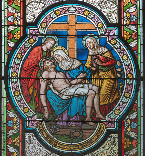 VIENNA, AUSTIRA - OCTOBER 22, 2020: The Deposition - Pieta on the stained gla...