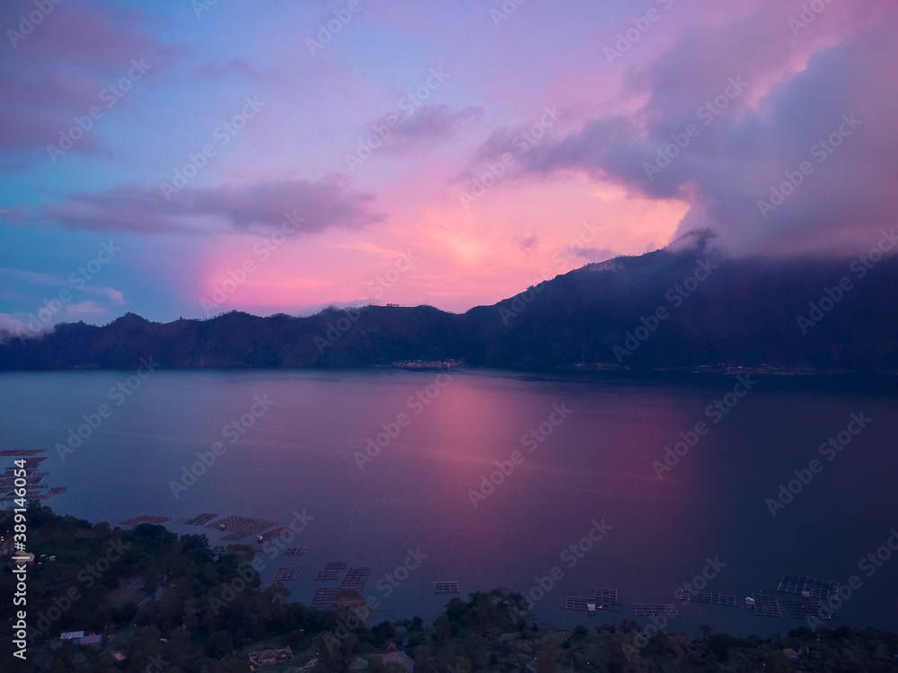 beautiful pink sunset in the Bay on the background of mountains, top view