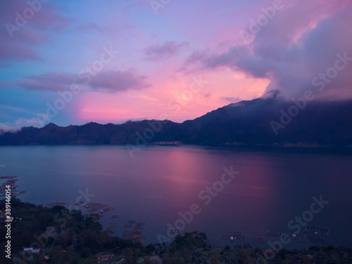 beautiful pink sunset in the Bay on the background of mountains, top view