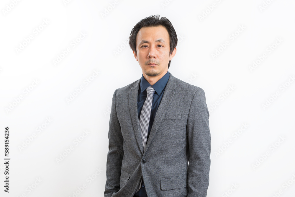 Successful Asian business man in suit and tie with confidence gesture on white background. Successful Asian business man in suit and tie with confidence gesture on white background.