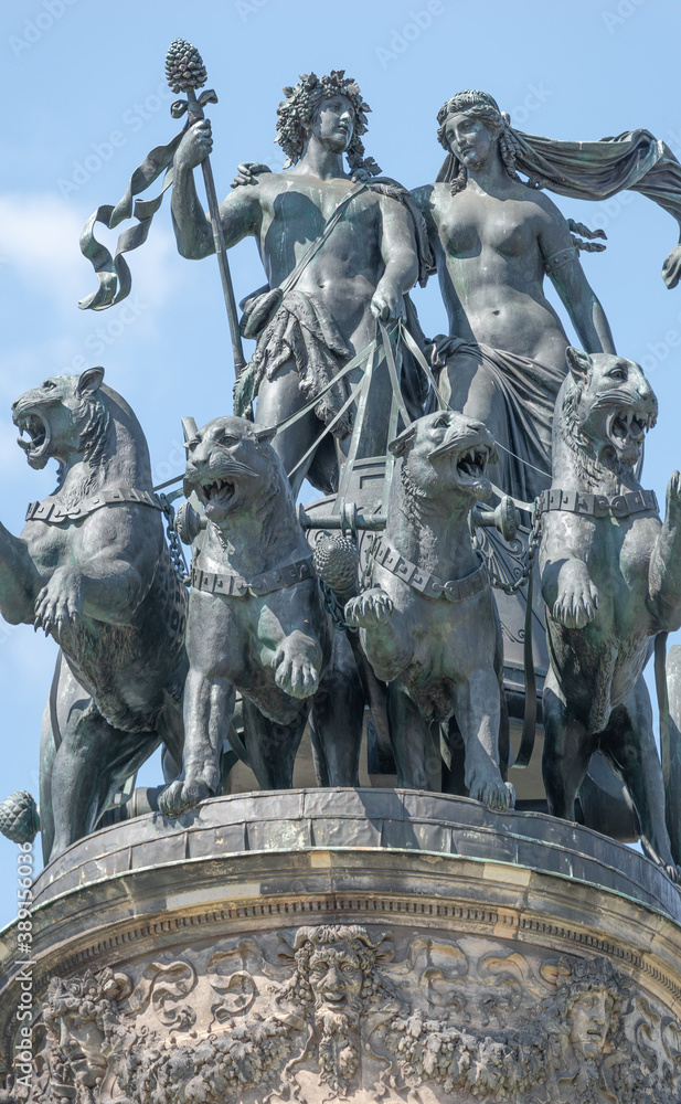 Old statue of Dionis and Aridna quadriga with four panthers on the top of the State Opera House in downtown of Dresden, Germany, details, closeup