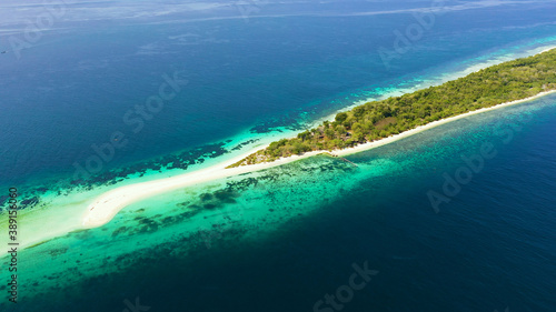 Tropical landscape: island with beautiful beach by turquoise water view from above.Little Santa Cruz island. Zamboanga, Mindanao, Philippines. Summer and travel vacation concept.