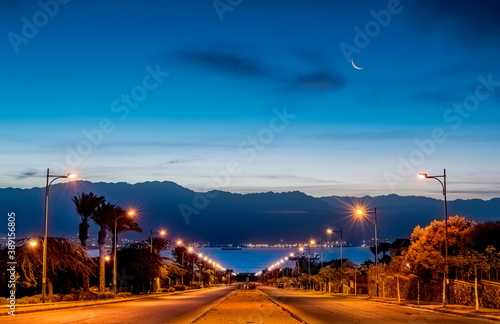 Morning at a street leading to the Red Sea in Eilat - famous tourist resort a...