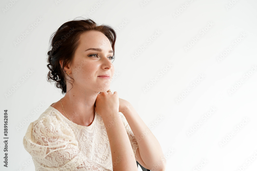 portrait of a young attractive fashion woman on a white background. portrait of a young attractive fashion woman on a white background.