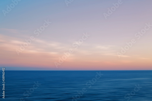 Motion blurred seascape at sunset