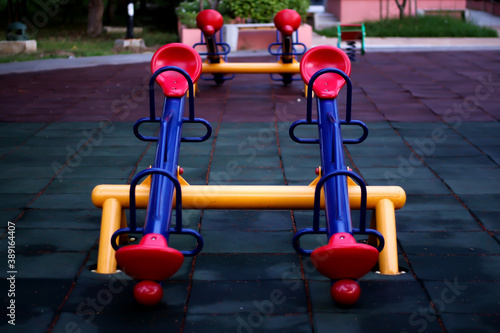 View playground in garden park colorful playground for children	