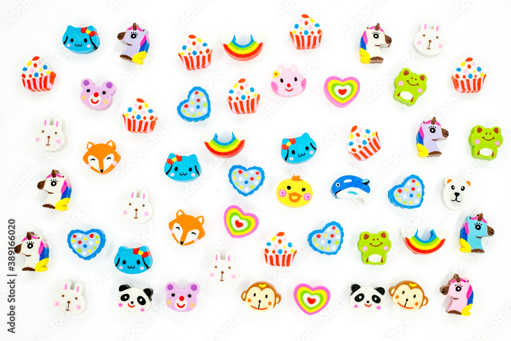 Obraz premium erasers with figurines on white background