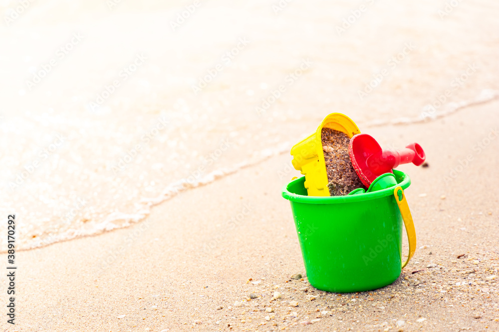 Beach toys on sand with a copy space Beach toys on sand with a copy space