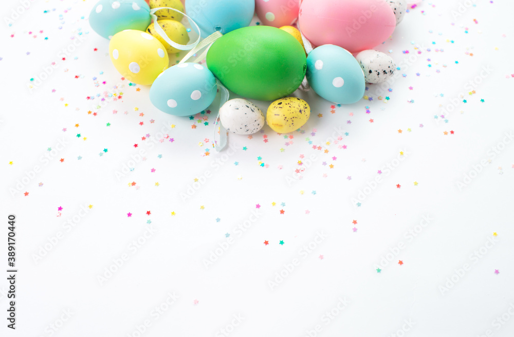 colorful Easter eggs lie on a light background colorful Easter eggs lie on a light background