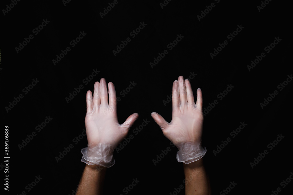Fototapeta premium hands in medical rubber gloves