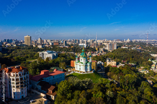 Aerial top view of Saint Andrew's church and Andreevska street from above, Podol district, city of Kyiv, Ukraine