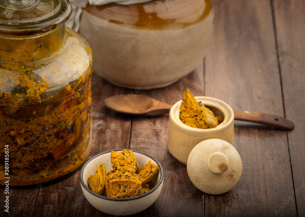 Homemade raw mango pickle, mango pickle is a traditional Indian condiment made with raw mangoes, spices and oil. Homemade raw mango pickle, mango pickle is a traditional Indian condiment made with raw mangoes, spices and oil.
