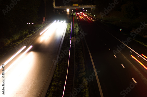 Highway at night with traffic blurred by motion in arnhem, Netherlands