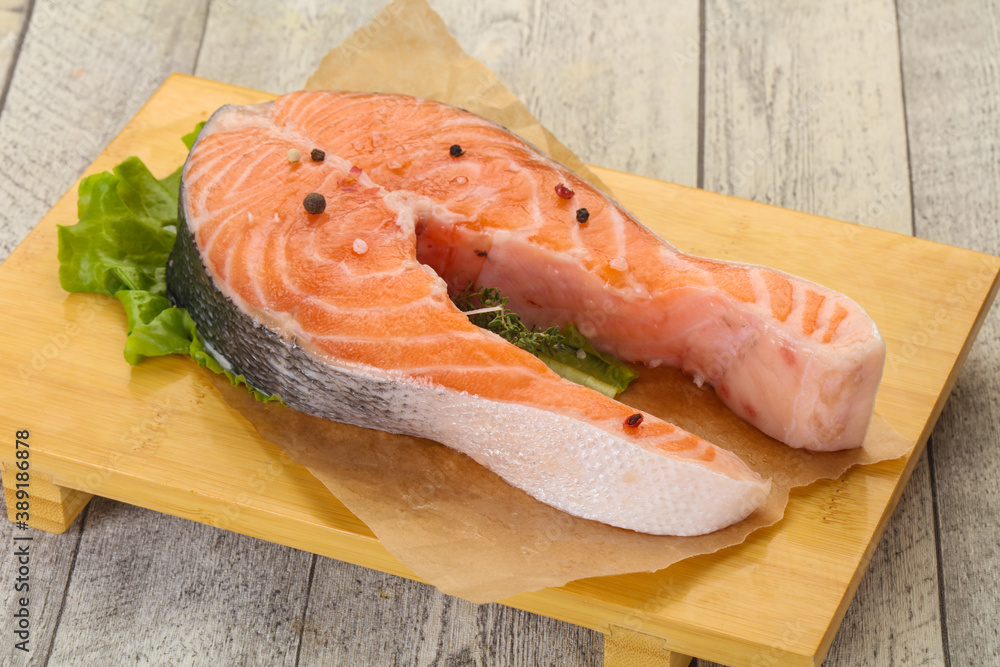 Raw salmon steak - ready for grill Raw salmon steak - ready for grill