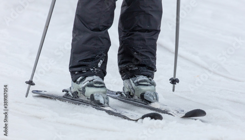 The skier is riding in the snow.