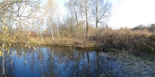 Autumn fishing on the pond, beautiful panorama.