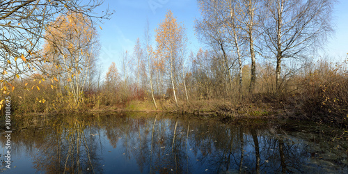 Autumn fishing on the pond, beautiful panorama.