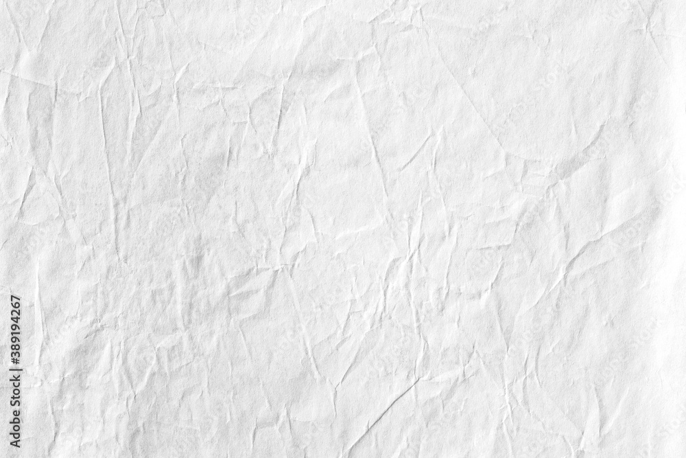 Crumpled paper white background texture
Crumpled paper white background texture