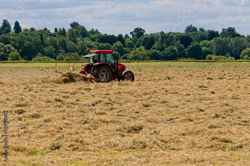 red tractor working in the field