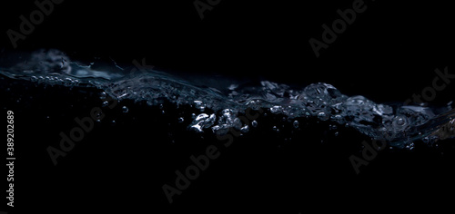 Wave of water on a black background