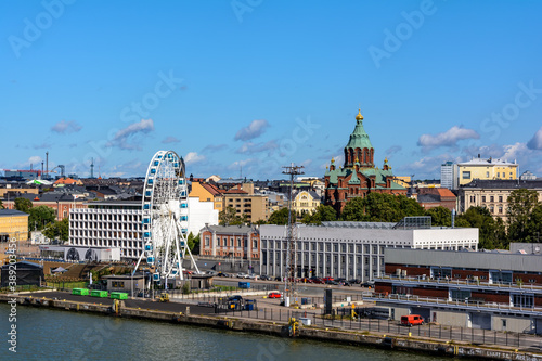 Helsinki city center shot from the sea. Embankment, The Uspenski Cathedral, Ferris wheel. Classic view of the center of Helsinki in a sunny weather.