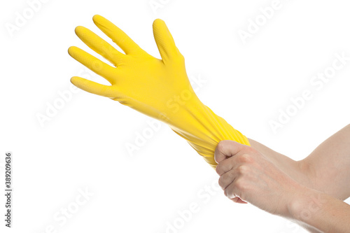 hand in yellow latex Glove For Cleaning isolated on white background.