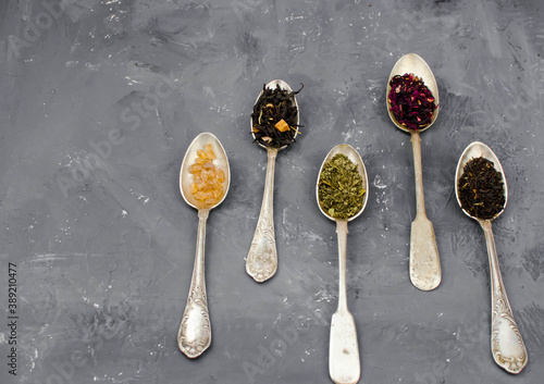 spoon with tea on the table