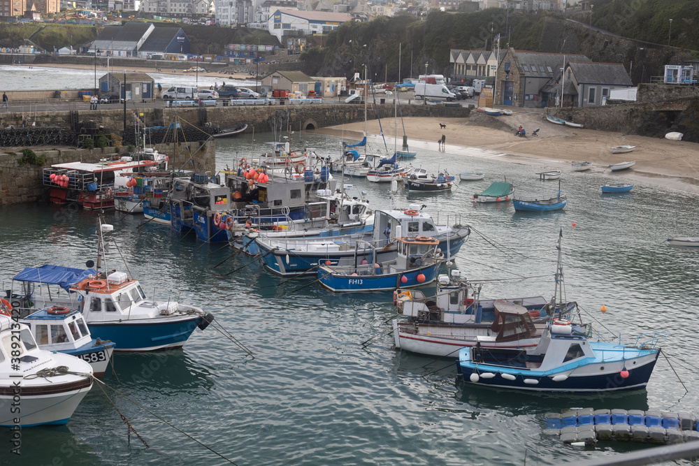 Boats safely harbored in Newquay harbour Cornwall