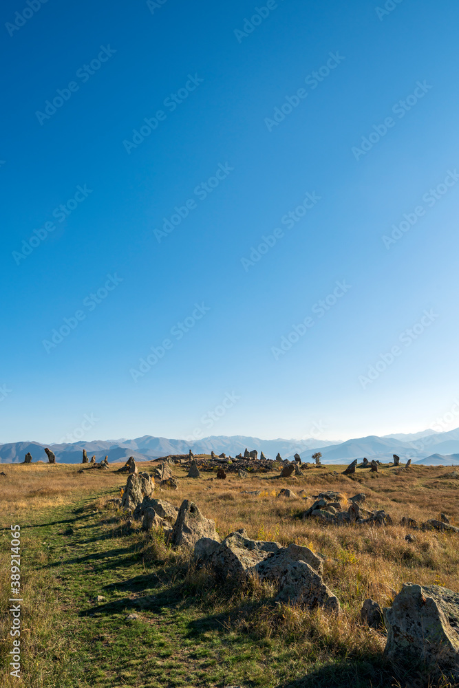 Fototapeta premium Carahunge, a prehistoric archaeological site close to town of Sisian in the Syunik Province, Southern Armenia. Sometimes called the Stonehenge of Armenia.