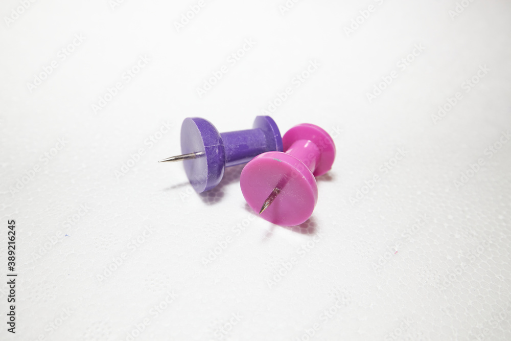 Two pins on white background Two pins on white background