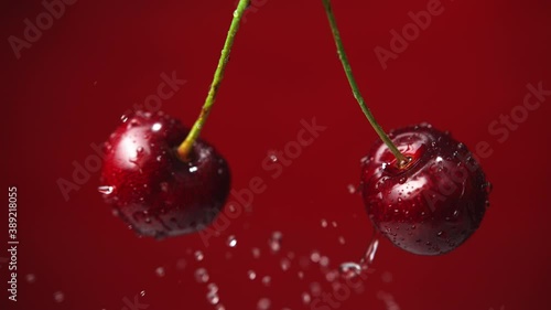 Sweet Cherries with Stems Colliding and Splashing Water Droplets. Shot in 1000fps with Phantom Flex 4K