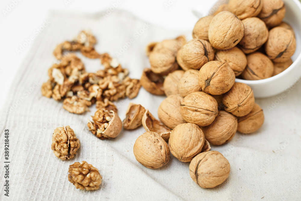 walnuts on a white wooden background walnuts on a white wooden background