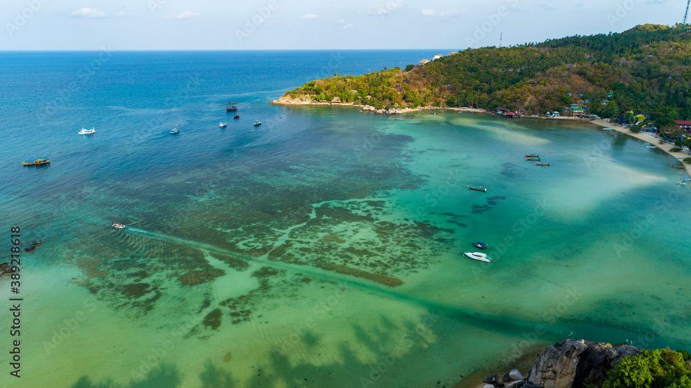 Aerial view drone uav top down birds eye view blue water and coral reef at Koh Tao Thailand by Drone High angle view.