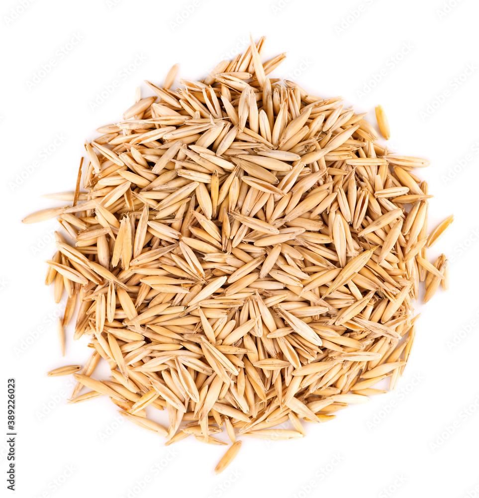 Unpeeled oat grains, isolated on white background. Organic dry oat seeds. Top view. Unpeeled oat grains, isolated on white background. Organic dry oat seeds. Top view.