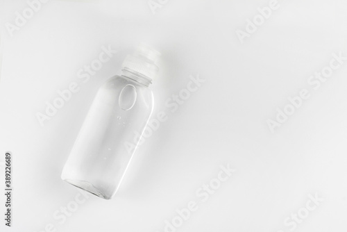 Bottle with antiseptic gel with blue background

