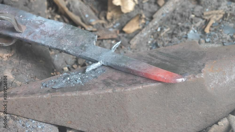 Close Up of Village Blacksmith Working With Hot Metal in Rural Madagascar Close Up of Village Blacksmith Working With Hot Metal in Rural Madagascar
