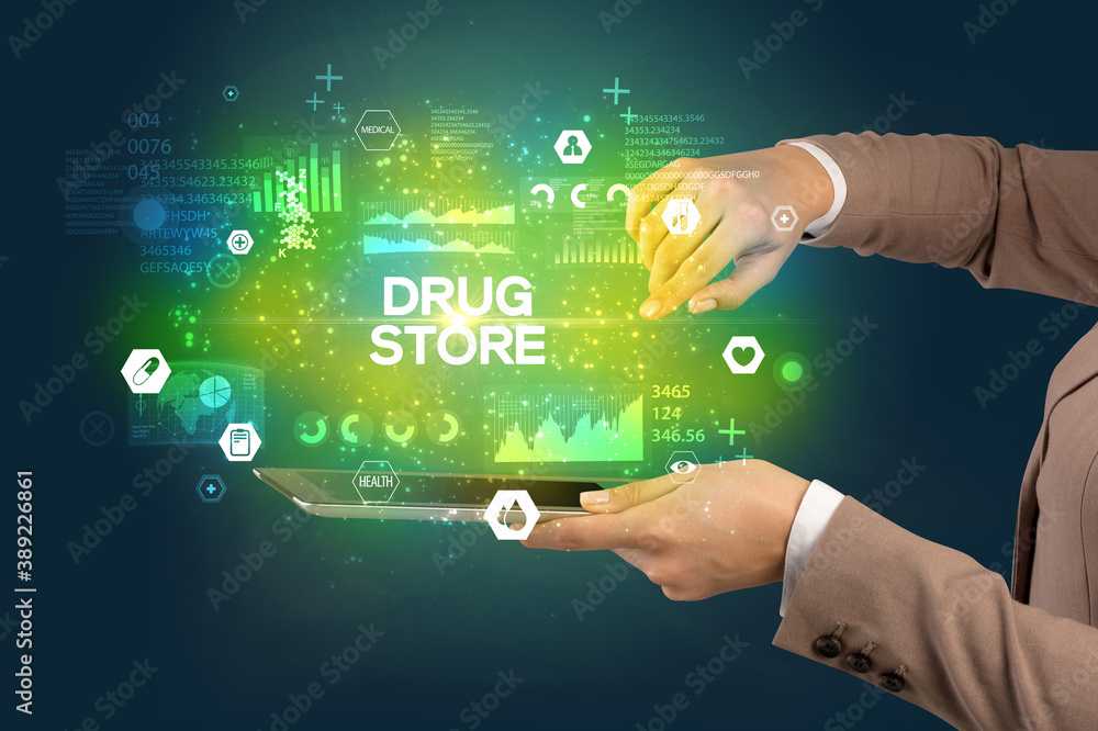 Close-up of a touchscreen with DRUG STORE inscription, medical concept Close-up of a touchscreen with DRUG STORE inscription, medical concept