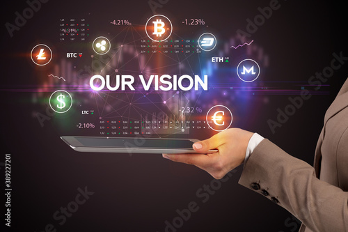 Close-up of a touchscreen with OUR VISION inscription, business opportunity concept