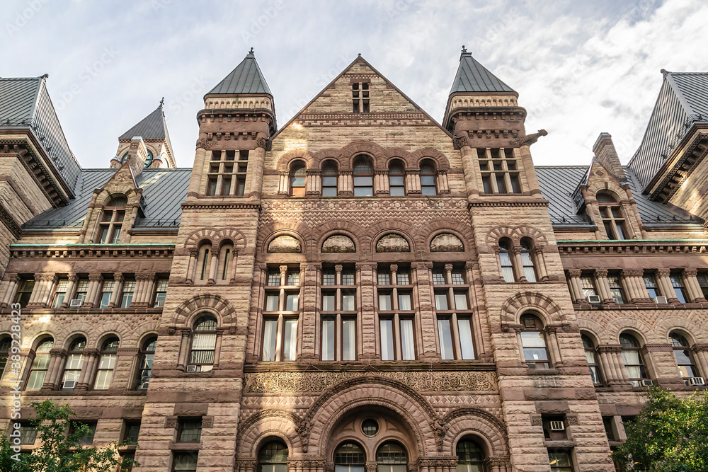 Toronto's Old City Hall (1899) was home to its city council from 1899 to 1966 and remains one of the city's most prominent structures. Toronto, Ontario, Canada.